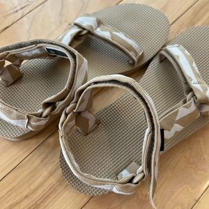 Tan and white Teva sandals